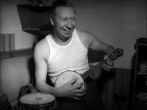 Actors And Musician Prints: George Formby Playing Ukulele Print 1953