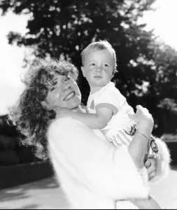 Gilly Coman with Son in Bread Print, November 1988