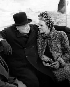 Prints of Sir Winston Churchill and wife Clementine seen here returning by boat after an inspection of bomb damage in the docks, London. 27th September 1940 Politic Prints: Sir Winston Churchill and Clementine Return by Boat, London 1940 Print