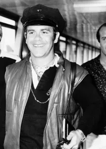 London Airport Arrivals Prints: Singer, Elton John, arriving at London Airport from Nice. 29th July 1980