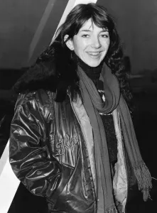 London Airport Arrivals Prints: Pop singer Kate Busharriving at London Airport wearing a leather jacket with fur collar