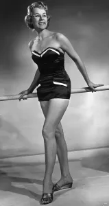 Vintage Beachwear Prints: Model wearing latest swimsuit beachwear design 1955