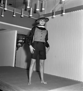60s Fashion Trends Prints: Mary Quant fashion clothing Model wearing shorts and a waistcoat and a hat