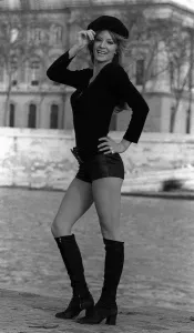 Prints of Paris Fashion Shorts and the French Girl feature by Mirror photographer Doreen Spooner Florence Fossorier aged 19 in her own clothes wearing hotpants and a black top, black hat and knee high boots Fashion Prints: Paris Fashion Shorts Print 00197