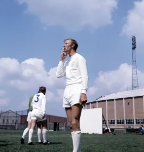 Prints of Leeds United footballer Jack Charlton smoking a cigarette during a training session August 1970 0200to0299 Prints: Leeds United Footballer Jack Charlton Print August 1970