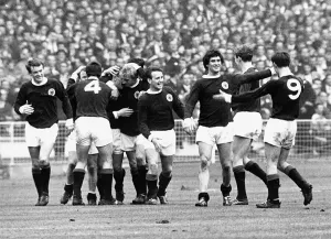 Prints of Scotland football team celebrate scoring goal in victory over England at Wembley, 1967. Scotland versus England 0200to0299 Prints: Print of Scotland football team celebrating at Wembley, 1967