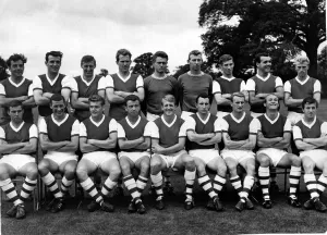 Prints of Sport - Football - Arsenal - Team 1963-64 Front Row - L to R - David Court, Terry Neill, Joe Baker, Freddie Clarke, John Barnwell, John McCleod, George Eastham, Jimmy Magill, George Armstrong Sport Prints: Arsenal Football Team Print 1963
