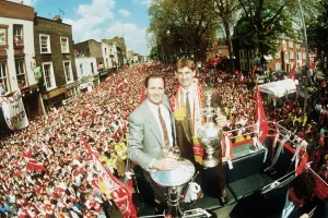 Prints of Arsenal manager George Graham and captain Tony Adams show off the League Championship trophy to thousands of fans gathered in the streets of North London for the teams open top bus parade Event Prints: Arsenal's 1991 League Championship Open Top Bus Parade Print