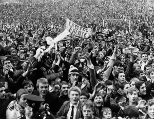 Prints of Crystal Palace fans celebrate their promotion to the First Division for the first time following their match against Fulham st Selhurst Park. 19th April 1969 0400to0499 Prints: Crystal Palace Promotion Print 1969