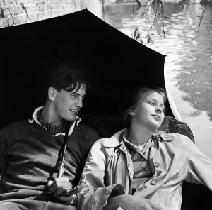 Prints of On the river Cam in Cambridge resting in a punt are James Innes of St Catherines college where he reads modern languages and Irene Cassel from Gottingen Cambridge Prints: Cambridge Punt Print, 1954: Language Students at Leisure