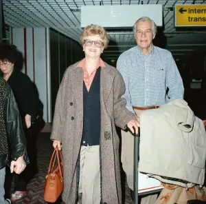 London Airport Arrivals Prints: Angela Lansbury and husband Peter Shaw at London Airport. 13th March 1990