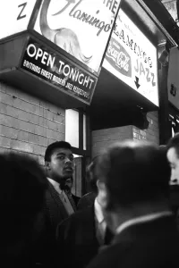 Prints of Cassius Clay (Muhammad Ali) outside the Flamingo Jazz Club in Wardour Street, Soho on the day of his arrival in London 0700to0799 Prints: Cassius Clay outside the Flamingo Jazz Club Print 1963