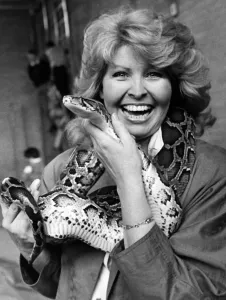 Cathy Secker with Sid the snake at St Bedes School Fete Print, 15th May 1988