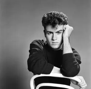 Prints of George Michael of the teenage pop duo Wham!, poses in the studio. 26th October 1982 0900to0999 Prints: George Michael Studio Print 26th October 1982