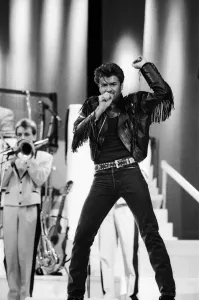 Prints of George Michael of pop duo Wham!, at their farewell concert entitled The Final. Wembley Stadium, 28th June 1986 0900to0999 Prints: George Michael at The Final Print - Wembley Stadium 1986