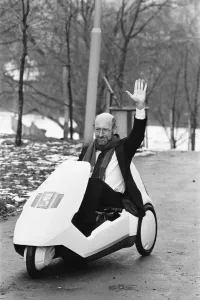 Sir Clive Sinclair in his C5 Electric Vehicle Print 1985