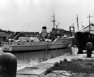 Prints of HMS Mersey, Minesweeper of the Mersey Division of the RNR comes alongside headquarters ship HMS Eaglet Salthouse Dock at the end of her fourth cruise of the year. September 1968 Merseyside Prints: HMS Mersey Minesweeper Print, September 1968