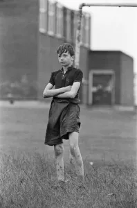Prints of David Bradley, (aged 14) playing the part of Billy Casper, pictured with his Kestral, on the film set of the film Kes. Here Billy Casper is playing the goalkeeper in the school football match scene Yorkshire Prints: David Bradley as Billy Casper, Kes Film Set Print (1968)