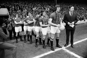 Prints of Manchester United v Blackpool, League Division Two, final score 4-0 to Manchester United. Pictured, some of the Manchester United players. Old Trafford, 26th April 1975 Greater Manchester Prints: Manchester United v Blackpool, 1975 League Division Two Print