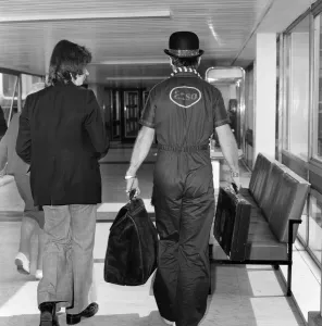 Elton John at Heathrow Airport, August 1975 Print