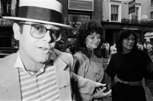 Entertainment News Archives Prints: Elton John and his wife Renate arrive at the Comedy Theatre. 14th June 1984