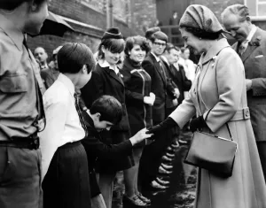 Prints of A regal curtsey for Queen Elizabeth II from 11-year-old Sheila Murray at Stockport Station. 16th May 1968 1300to1399 Prints: 1968 Print of Royal Encounter at Stockport Station