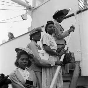 Prints of Nearly 700 West Indian men, women and children arrive at Plymouth on SS Auriga in a mass immigration party to find homes 1300to1399 Prints: Mass Immigration Party Arrives in Plymouth Print 1954
