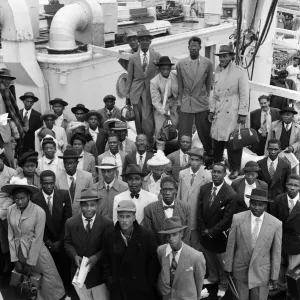 Prints of Nearly 700 West Indian men, women and children arrive at Plymouth on SS Auriga in a mass immigration party to find homes. 8th September 1954 1300to1399 Prints: Mass Immigration Party, Plymouth 8th September 1954 Print