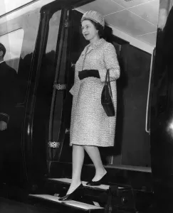 Prints of Queen Elizabeth II steps off the Royal Train at Bryn Station. 17th May 1968 Greater Manchester Prints: Queen Elizabeth II Steps Off Royal Train Print