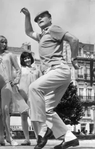 Prints of GENE KELLY PERFORMS ON THE SET OF THE YOUNG GIRLS OF ROCHEFORT - 14TH JUNE 1966 1400to1499 Prints: Gene Kelly Print - 1966 Film Still