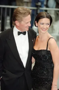 Prints of Catherine Zeta-Jones and Michael Douglas at the film premiere of Entrapment at the Odeon cinema, Edinburgh, Scotland. 30th June 1999 1500to1599 Prints: Catherine Zeta-Jones and Michael Douglas at Entrapment film premiere Print