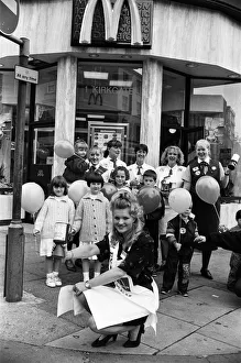 Miss Examiner Andrea Stokes shares a collecting tin outside McDonalds's Huddersfield Miss Examiner Andrea Stokes shares a collecting tin outside McDonalds's Huddersfield