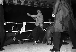 Mob invaded the ring after champion Dick Richardson had retained his European heavyweight Mob invaded the ring after champion Dick Richardson had retained his European heavyweight