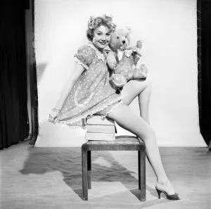 Model Audrey Nicholson wearing nightee seen here with her Teddy bear. 1959 Model Audrey Nicholson wearing nightee seen here with her Teddy bear. 1959