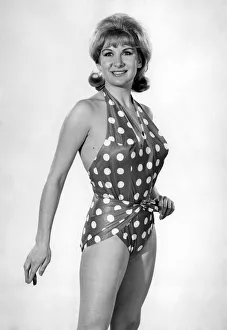 Model Caron Gardner wearing a polka dot patterned swimsuit Model Caron Gardner wearing a polka dot patterned swimsuit