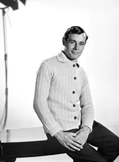 Model John Handy wearing cardigan in Reveille Studio . 1960 Model John Handy wearing cardigan in Reveille Studio . 1960