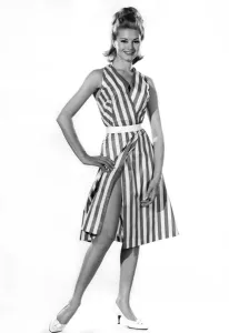 Model Margaret Lorraine wearing striped sleeveless dress with bellt Model Margaret Lorraine wearing striped sleeveless dress with bellt