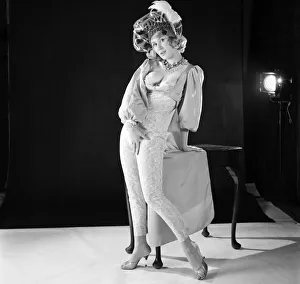Model Rita Royce seen here modelling trouser suit with matching hat. 1960 E433-003 Model Rita Royce seen here modelling trouser suit with matching hat. 1960 E433-003