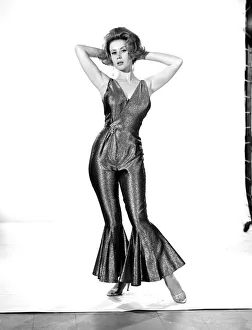 Model Rita Royce wearing lurex suit. Circa 1963 Model Rita Royce wearing lurex suit. Circa 1963