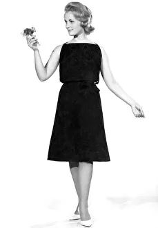 Model Roma Reeves wearing a sleveless black dress. October 1961 P007829 Model Roma Reeves wearing a sleveless black dress. October 1961 P007829