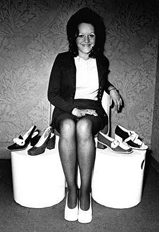 A model showing off some shoes from July 1970 A model showing off some shoes from July 1970
