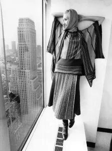 Model wearing a clutch cargo-striped wool, Mohair and silk skirt Model wearing a clutch cargo-striped wool, Mohair and silk skirt