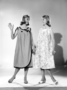 Models Baker twins wearing night dresses. July 1962 Models Baker twins wearing night dresses. July 1962