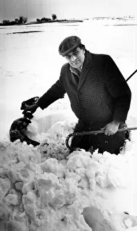 Moment of heartbreak for farmer Mr Richard Vaughan as he pulls a dead lamb from a deep Moment of heartbreak for farmer Mr Richard Vaughan as he pulls a dead lamb from a deep