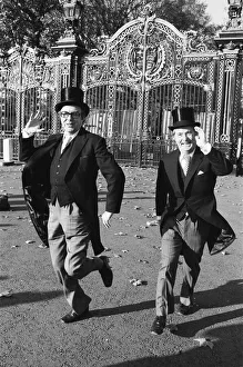 Morecambe and Wise seen here outside the gates of Buckingham Palace doing their Morecambe and Wise seen here outside the gates of Buckingham Palace doing their
