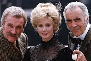 Morgan Fairchild centre with Christopher Lee right who plays the part of Sherlock Holmes Morgan Fairchild centre with Christopher Lee right who plays the part of Sherlock Holmes
