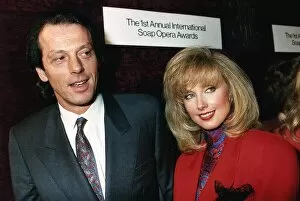 Images Dated 7th November 1989: Morgan Fairchild with Leslie Grantham at the First annual International Soap Awards