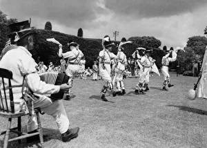 Morris dancers at Thaxted in Essex perform on the village green. June 1939 P029097 Morris dancers at Thaxted in Essex perform on the village green. June 1939 P029097