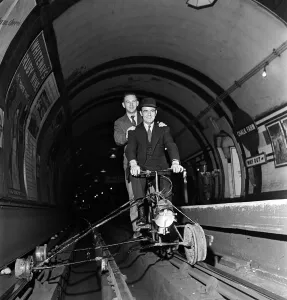 Mr B F Harris on a specially constructed cycle on which he makes his nightly inspection Mr B F Harris on a specially constructed cycle on which he makes his nightly inspection