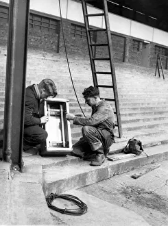 Mr C Urquhart and Mr A Moody working on a buzz bar chamber at the beginning of works Mr C Urquhart and Mr A Moody working on a buzz bar chamber at the beginning of works